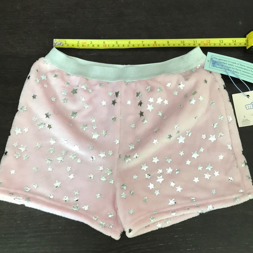 Pink fuzzy sleeping shorts with silver stars